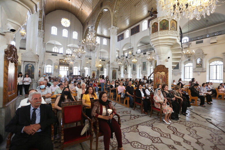 Cristiani a messa nella chiesa al-Maryamiyeh di Damasco in Siria - RIPRODUZIONE RISERVATA