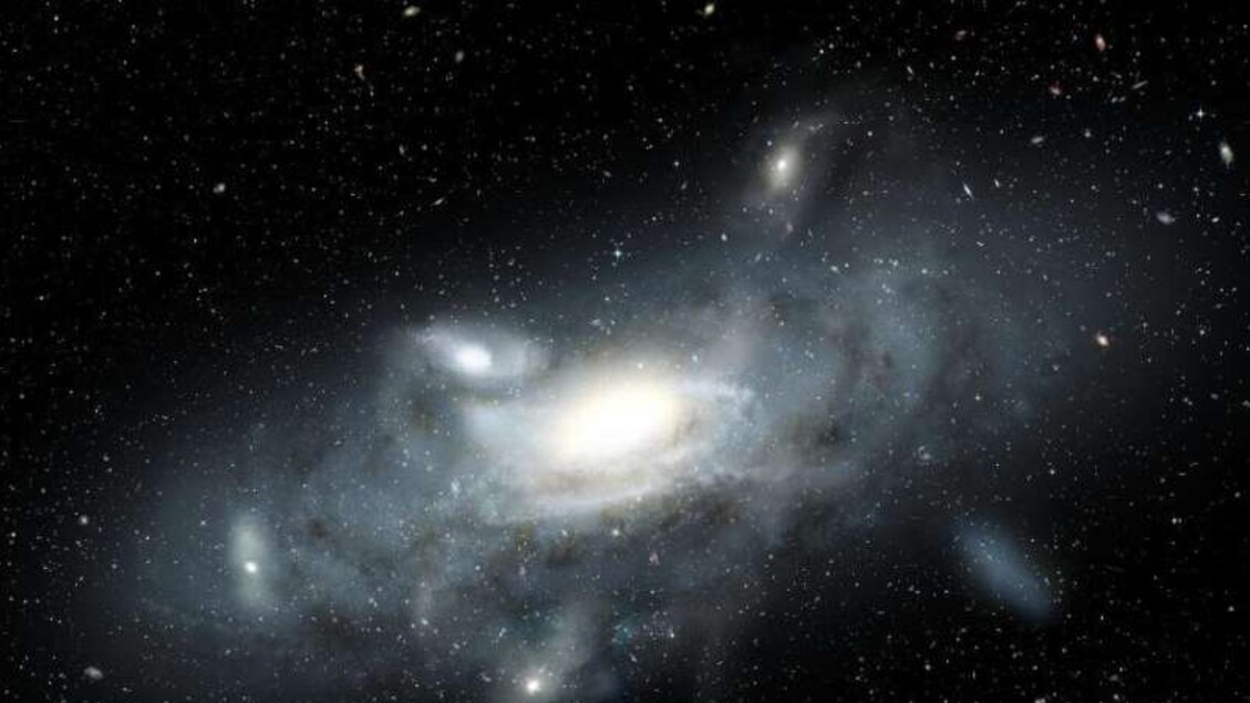 Rappresentazione artistica della Via Lattea quando era ancora una galassia molto giovane, composta da 5 piccole galassie, diverse fra loro in forma e dimensioni (fonte: James Josephides, Swinburne University,CC BY 4.0) - RIPRODUZIONE RISERVATA
